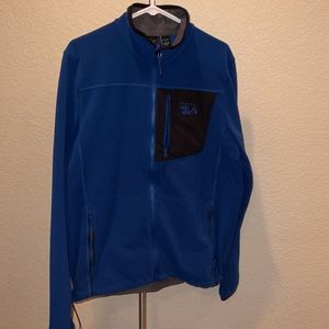 Mountain Hardwear blue fleece. Waste-band drawstring and chest sunglass pocket